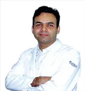 Dr  Dinesh Rattnani